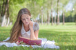beautiful girl with book outdoor