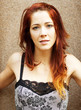 pretty redhead woman - challenging stare - head and shoulders