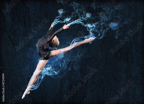 Photo: Young woman in gymnast suit posing Young woman in gymnast suit posing