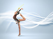 Young woman in gymnast suit posing