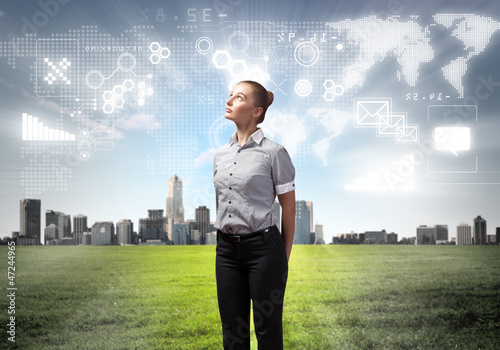 Photo: Businesswoman agaisnt virtual background Businesswoman agaisnt virtual background
