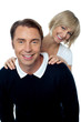 Love couple posing casually in front of camera