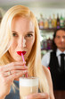 Barista with client in his cafe or coffeeshop