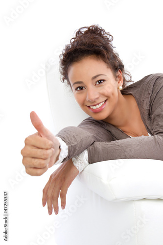 Photo: Yes - we can! Junge Frau mit Daumen hoch Yes - we can! Junge Frau mit Daumen hoch