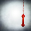 Foto: red phone hanging red phone hanging