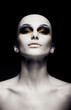 Bald futuristic woman - clean shaven head. Fashion design