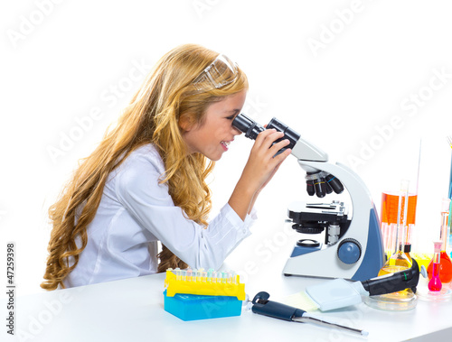 Photo: Children student girl in kid chemical laboratory Children student girl in kid chemical laboratory