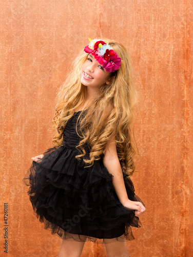 Photo: black dress kid girl dancing on vintage background black dress kid girl dancing on vintage background