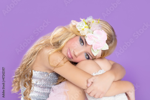 Photo: blond princess fashion girl with spring flowers blond princess fashion girl with spring flowers