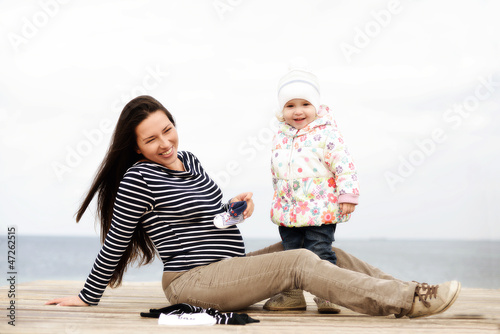 Photo: pregnant mother with daughter pregnant mother with daughter
