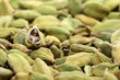 Green cardamom seeds. Aromatic spice.texture background