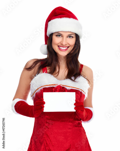 Photo: Santa helper Christmas girl with a card. Santa helper Christmas girl with a card.
