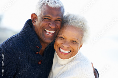 Photo: Romantic Senior Couple Hugging On Beach Romantic Senior Couple Hugging On Beach
