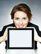 canvas print picture - Business woman presenting her tablet pc with copyspace