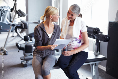 Photo: Working through the contract with a senior client Working through the contract with a senior client