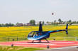 Helicopter Robinson on helipad