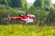 helicopter (Sud Aviation SA316B Alouette III) on a field