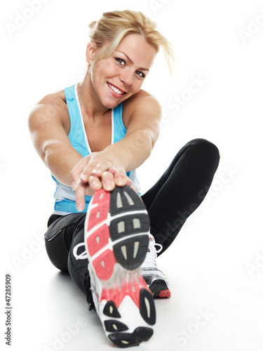 Photo: Atletic woman exercising Atletic woman exercising