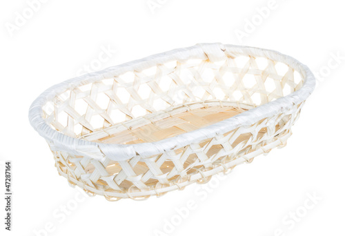 Photo: Wickerwork empty yellow breadbasket on white background Wickerwork empty yellow breadbasket on white background