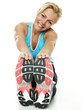 Beautiful atletic woman exercising on the floor