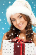 santa helper girl with gift box