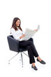 Casual 20s women reading newspaper, amused