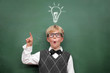 canvas print picture - Schoolboy at the Blackboard with Idea