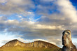 Head of moai with mountain in background in Easter Island