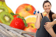 Foto: sporty woman and fresh fruits sporty woman and fresh fruits