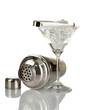 Cocktail shaker and cocktail glass isolated on white