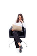 Casual 20s woman reading stock rates in newspaper 2
