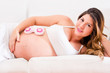 Woman pregnant with a baby girl