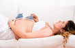 Pregnant woman daydreaming