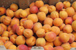 Peaches in a Market Bin