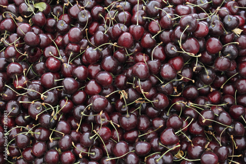 Photo: Dark Red Cherries in a Market Display Dark Red Cherries in a Market Display