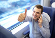 Young successful businessman in the train.
