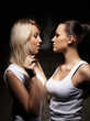 Beautiful woman exhaling smoke into face brunette