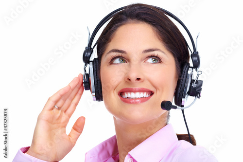 Photo: Call center operator woman. Call center operator woman.