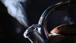 boiling kettle on a black background 1