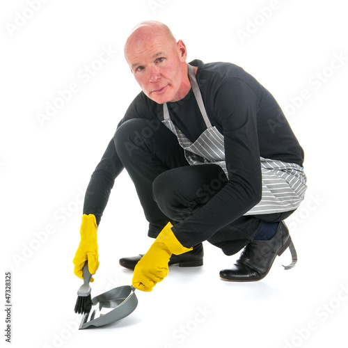 Photo: Houseman with dustpan and brush Houseman with dustpan and brush