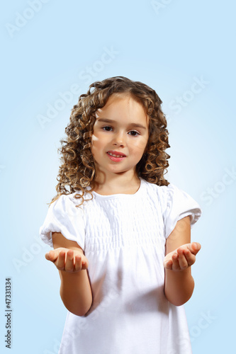 Photo: portrait of a cute little girl portrait of a cute little girl