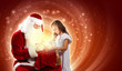 Photo: portrait of santa claus with a girl portrait of santa claus with a girl