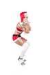 sexy frau als weihnachtsfrau mit high heels und geschenk
