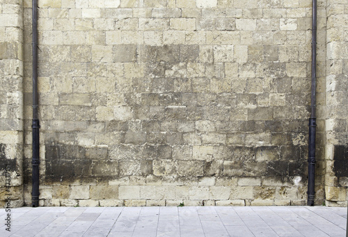 Photo: Stone wall with pipes Stone wall with pipes