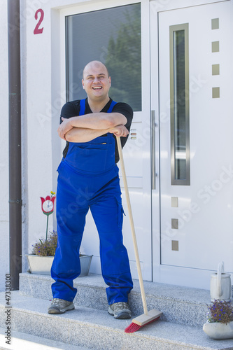 Photo: Arbeiter mit Straßenbessen Arbeiter mit Straßenbessen