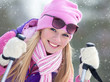 Portrait of blondy young woman with ski in winter time