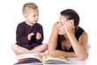Photo: Mother and child reading picture book Mother and child reading picture book