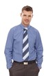 Confident businessman with hands in pockets