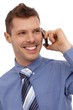 Happy businessman on phone call