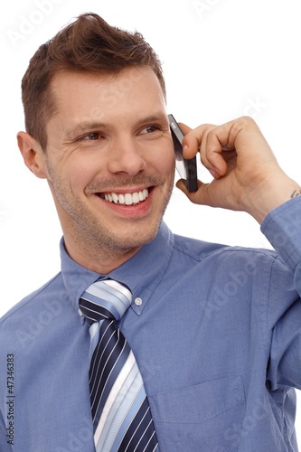 Photo: Happy businessman on phone call Happy businessman on phone call